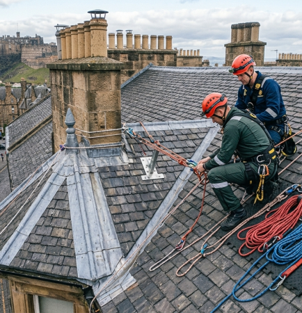 rope access team rigging safely from the roof of a traditional Edinburgh tenement